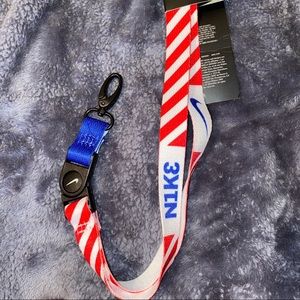 Blue, red and white Nike Lanyard